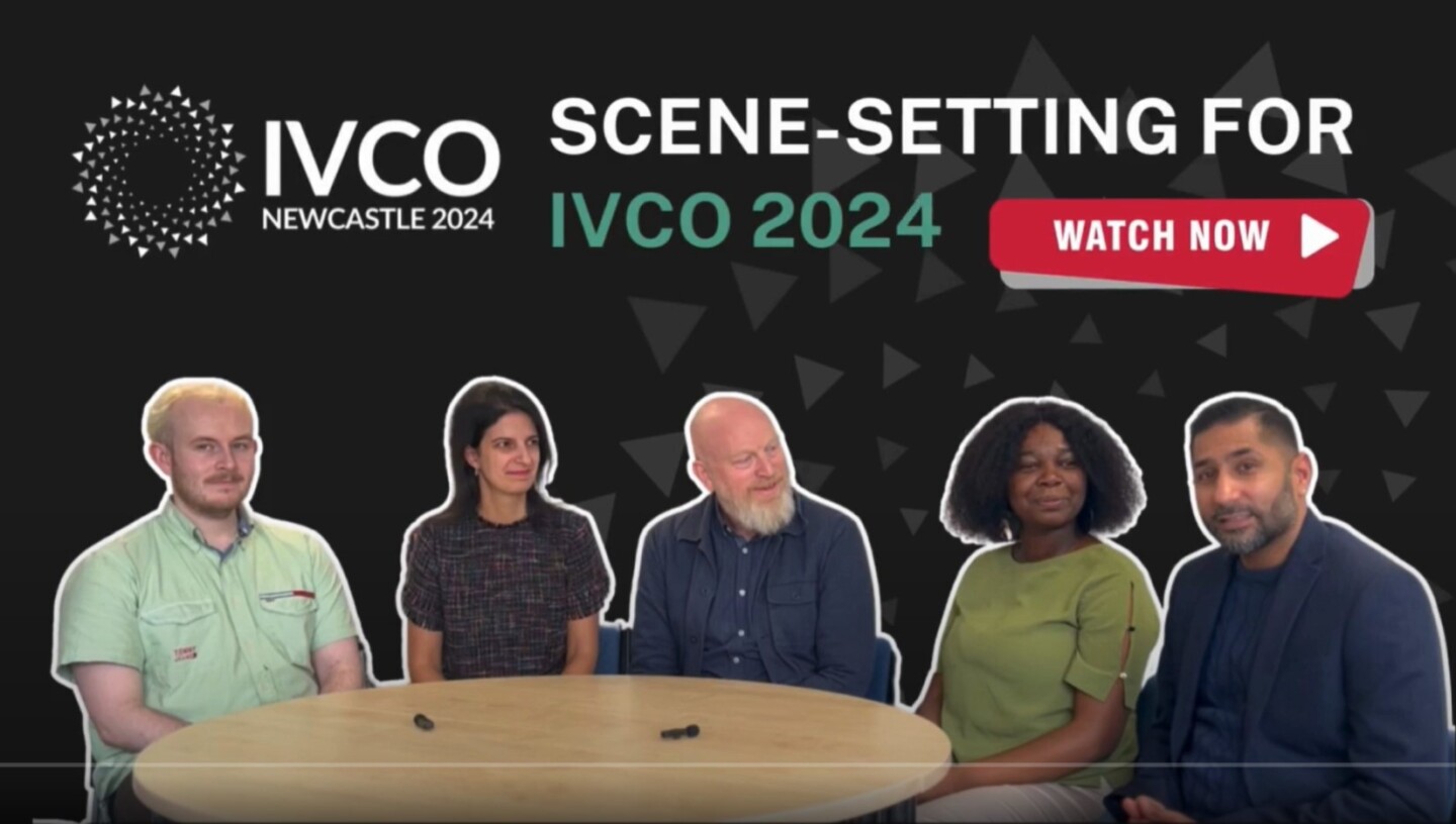 Five people seating around a table with the heading 'Scene-Setting For IVCO 2024' and sub-heading 'Watch Now'